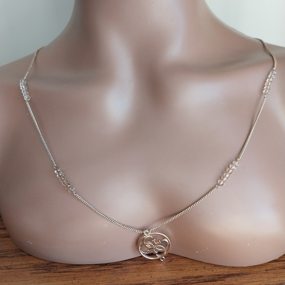 Guess Gold and Crystal Pendant Necklace - Picture 13 of 13